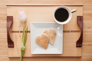 Fototapeta na wymiar Romantic valentines day breakfast, love heart shape toast and co