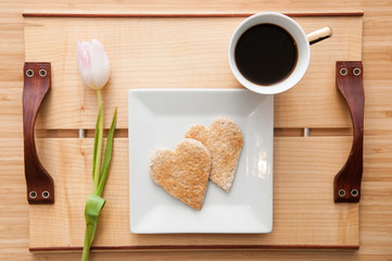 Romantic valentines day breakfast, love heart shape toast and co
