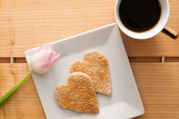 Romantic valentines day breakfast, love heart shape toast and co