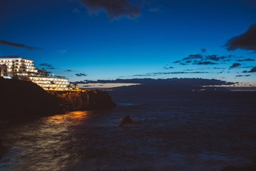 Night view on coastline and ocean