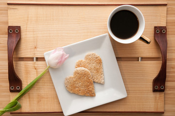 Romantic valentines day breakfast, love heart shape toast and co