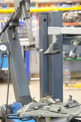 The image of a tire fitting machine