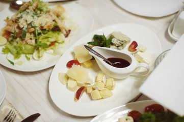 table set service with silverware and glass stemware at restaurant before party