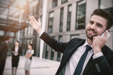 Businessman talking on mobile phone