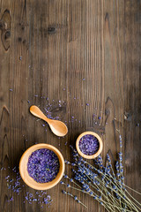 organic cosmetics with lavender on wooden background top view