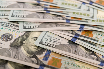 Heap of cash in hundred dollar bills