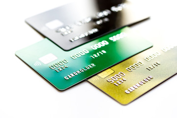 pile of credit cards on white background