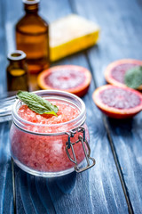 organic cosmetic with citrus on blue background