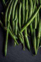 Obraz premium Green beans on slate