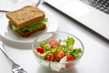 concept of lunch in office at work desktop