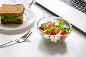 concept of lunch in office at work desktop