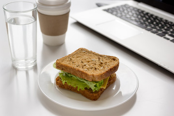 concept of lunch in office at work desktop