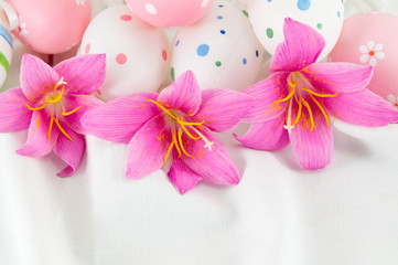 Fototapeta premium Easter eggs with purple flowers