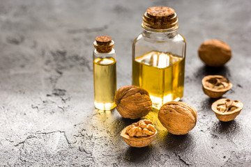 cosmetic and therapeutic walnut oil on dark background