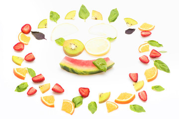 watermelon, strawberry, leaves, kiwi and orange isolated on white