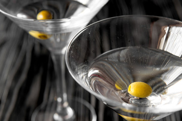martini cocktail at wooden background close up
