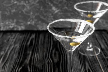 martini cocktail at wooden background close up