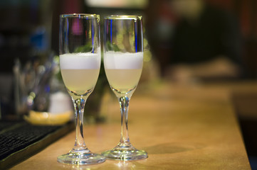 glasses of champagne at the bar