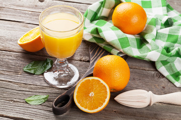 Fresh ripe oranges and juice