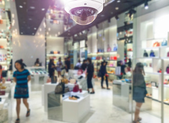 CCTV security camera on shopping department store.