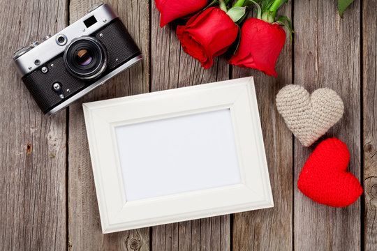 Valentines day roses, photo frame and hearts