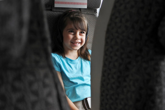 Plane Passenger Child Watching Inflight Movie