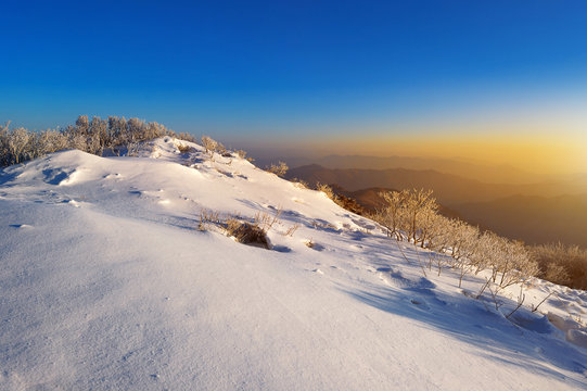 Sunrise on Deogyusan mountains covered with snow in winter,South korea.