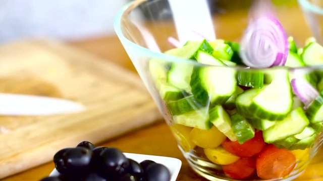 preparing fresh ceasar salad