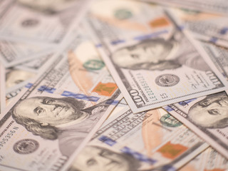 One hundred dollar bills. Inflation. Deflation. Worth. Trades. Economy. Benjamin Franklin money. Currency. 