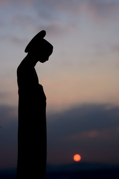 The Virgin Mary prayed in the sunset