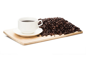 coffee mug on wooden plate with roasted coffee bean in background. Isolated on white background with clipping path.