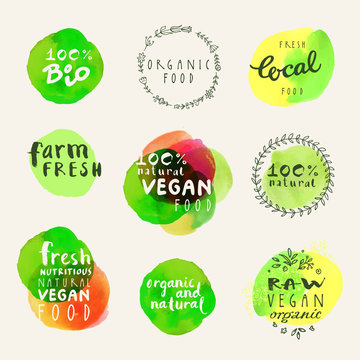 Watercolor organic labels collection. Retro style set of 100% bio organic gluten free eco bio food restaurant menu logo label templates with floral and vintage elements and watercolour splashes