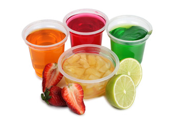 Jam in plastic with raw fruit on white background