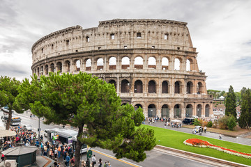 Fototapeta na wymiar Cloudy view of ancient amphitheater Colosseo in Rome, Lazio region, Italy.