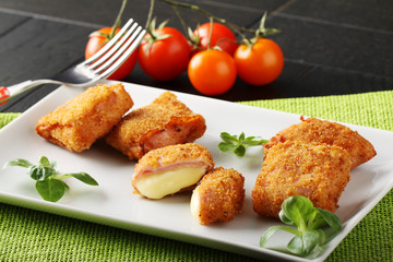 Crispy rolls of ham with cheese