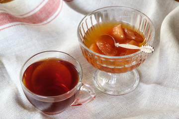 Cup of tea and apple jam dessert or confiture