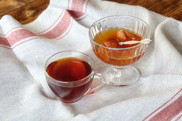 Cup of tea and apple jam dessert or confiture