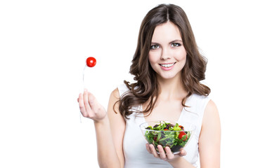 Young woman with vegetarian salad vegetables.