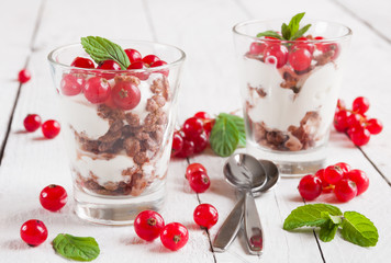 Dessert with fresh red currant and mint