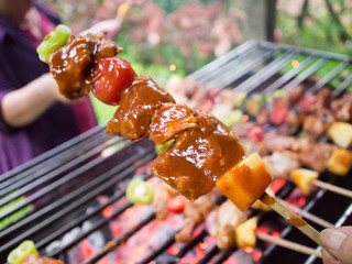 Bar-B-Q or BBQ with kebab cooking. coal grill of pock meat skewe