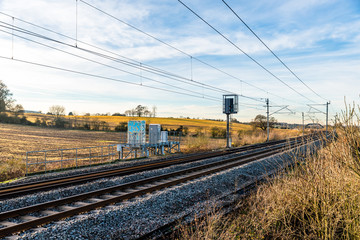 Fototapeta na wymiar Day view of UK Railroad in England. Railway landscape