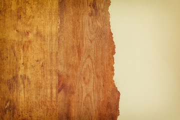 wooden board background with torn paper
