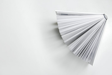Open empty white book. Top view.