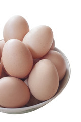 Eggs cooking for breakfast, a protein form yolk and albumen on a white background, or on a plain wooden table.