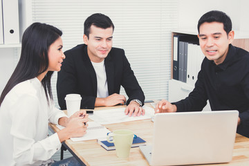 Casual business people discussing work in the meeting