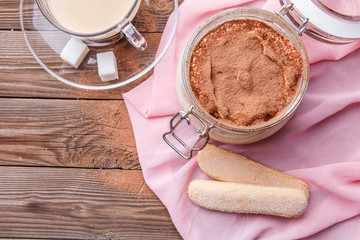 Tiramisu, savoiardi cookies with mug