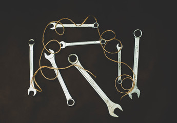 Wrenches on a brown background