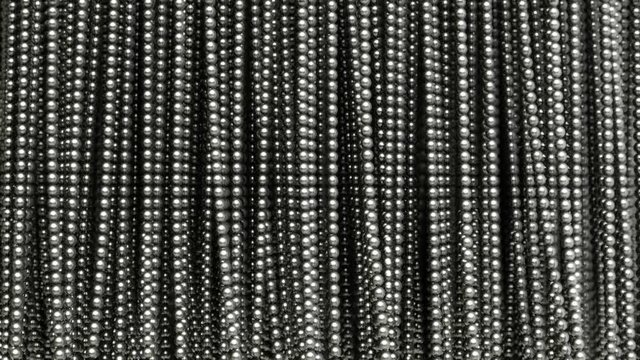 Abstract metal curtain. Ball chain.