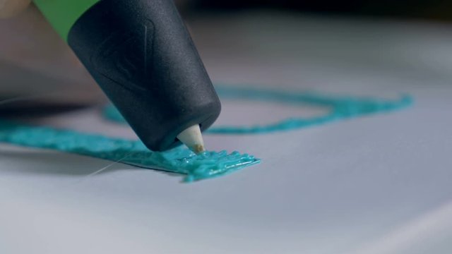 Innovative production technology. 3D pen making real glasses with plastic. 4K.