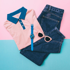 polo tee shirt, jeans and accessories. fashion pastel blue and pink palette.